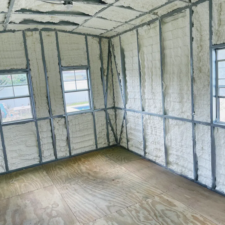 Closed-cell spray foam insulation applied to wall cavities in a residential project in Totowa
